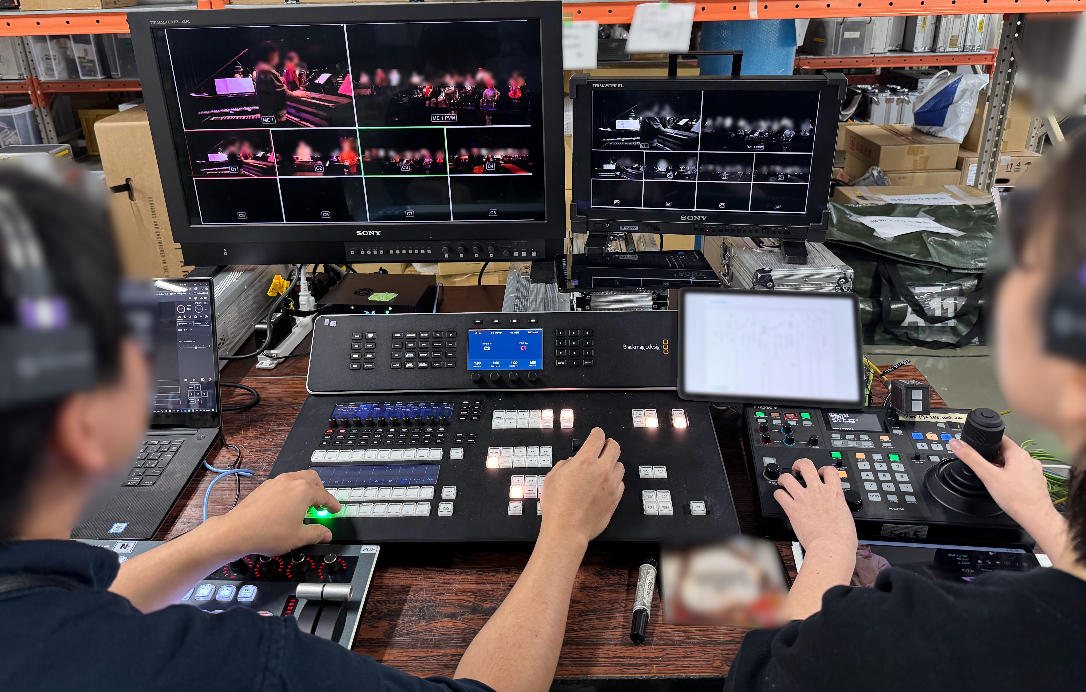Operation during the live production (front: switcher, right: PTZ).